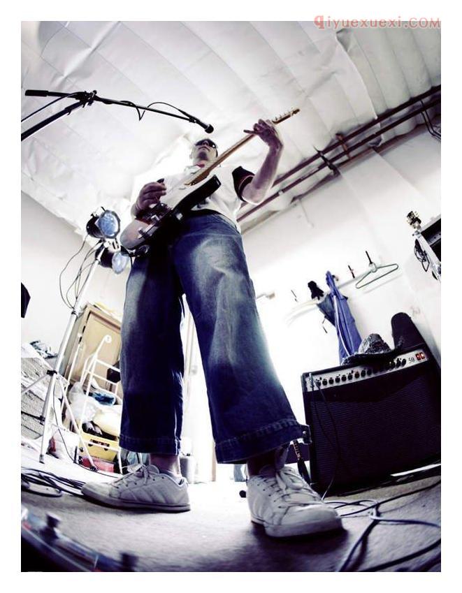 吉他弦过高调节方法